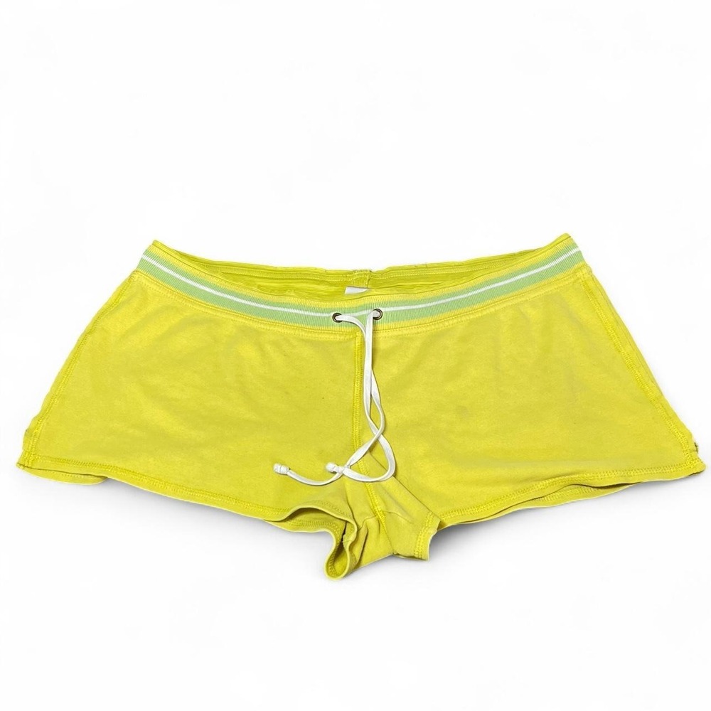 Yellow mini shorts with white/green stripe and drawstring waist